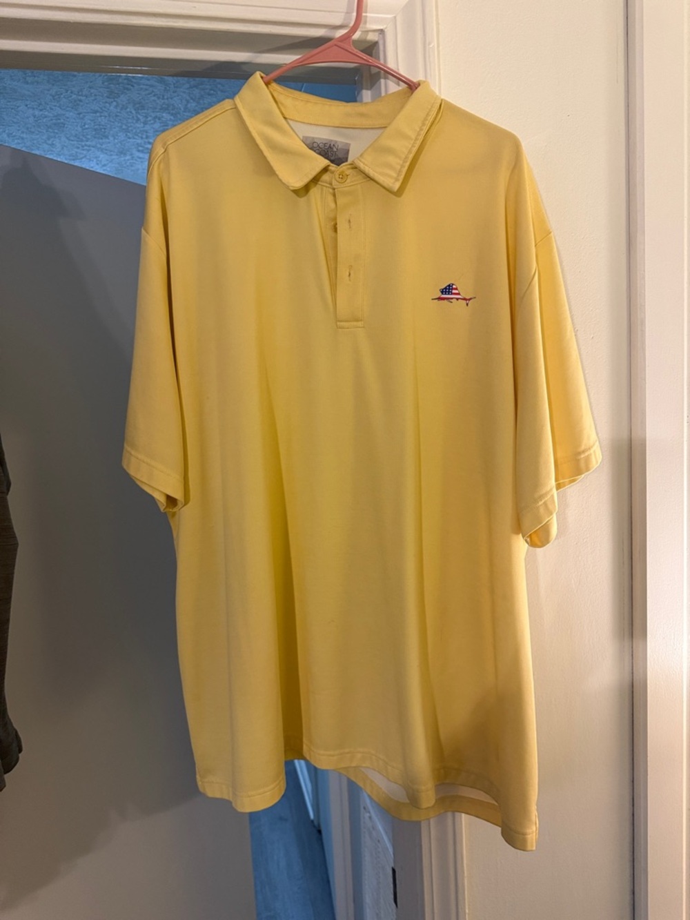 Men's Yellow Polo with Subtle Flag Fish Logo